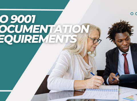 ISO 9001 documents requirements. A man and a woman discussing.